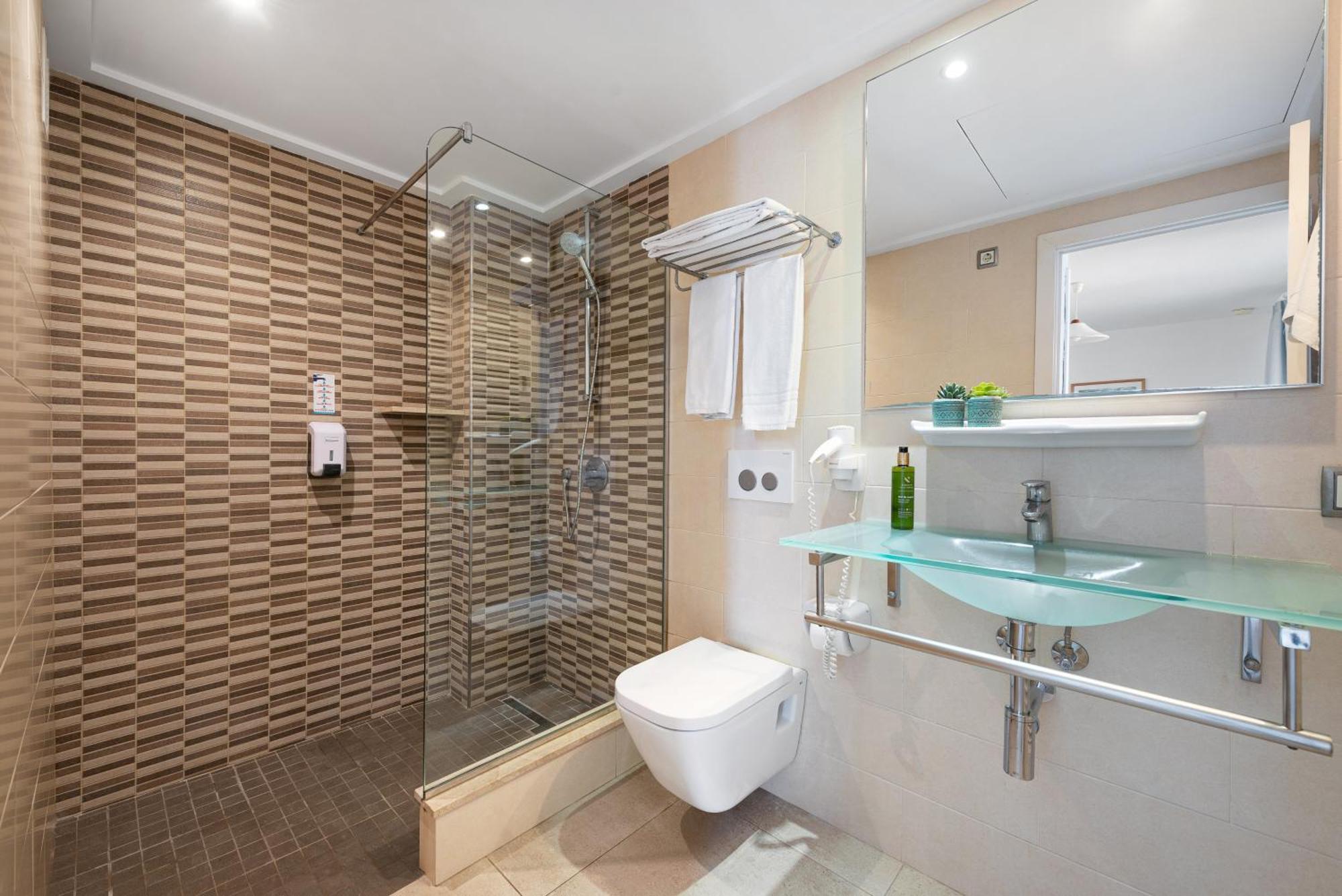 Apartamentos Ferrera Pins Кала Ферера Екстериор снимка